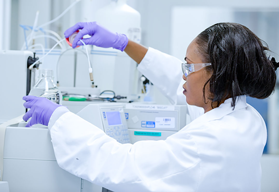 Amgen scientist preparing samples in the Chemistry lab.